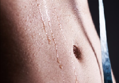 Woman Sweating from Infrared Sauna